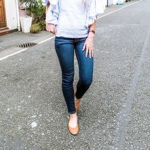 Tieks earth tone flats.